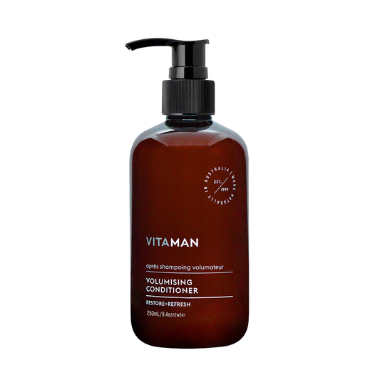 Brown conditioner bottle with pump labeled 'Vitaman