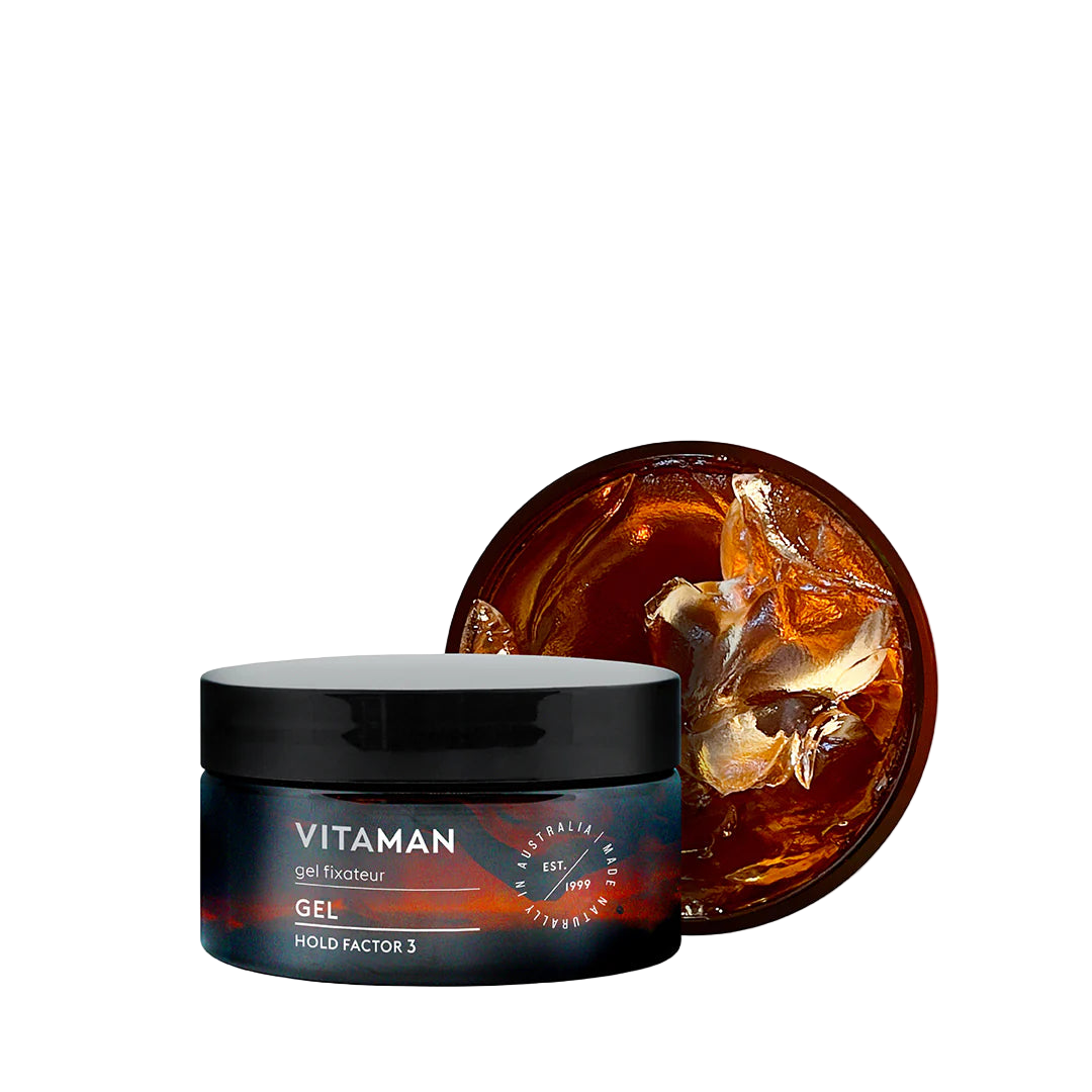 Vitaman gel jar with open lid showing gel texture