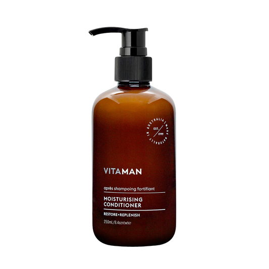 Brown conditioner bottle with pump labeled 'VITAMAN'