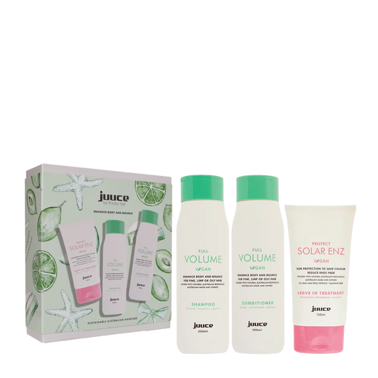 Juice hair care product set with bottles and packaging on a white background
