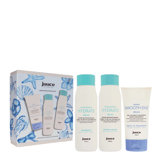 Juuce skincare product set with packaging, bottles, and a tube on a white background